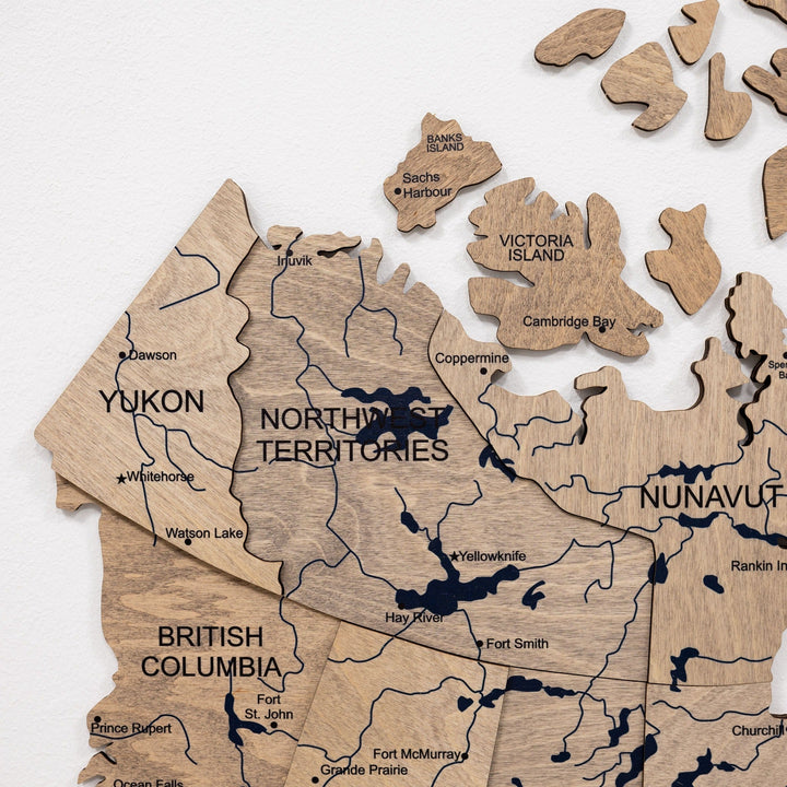Wooden Canada map wall decor showing provinces and territories with printed routes.