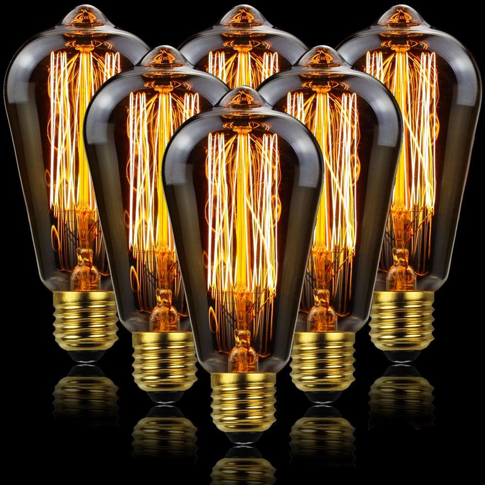 Vintage Edison incandescent bulb set with clear glass and visible amber filament, gold bases
