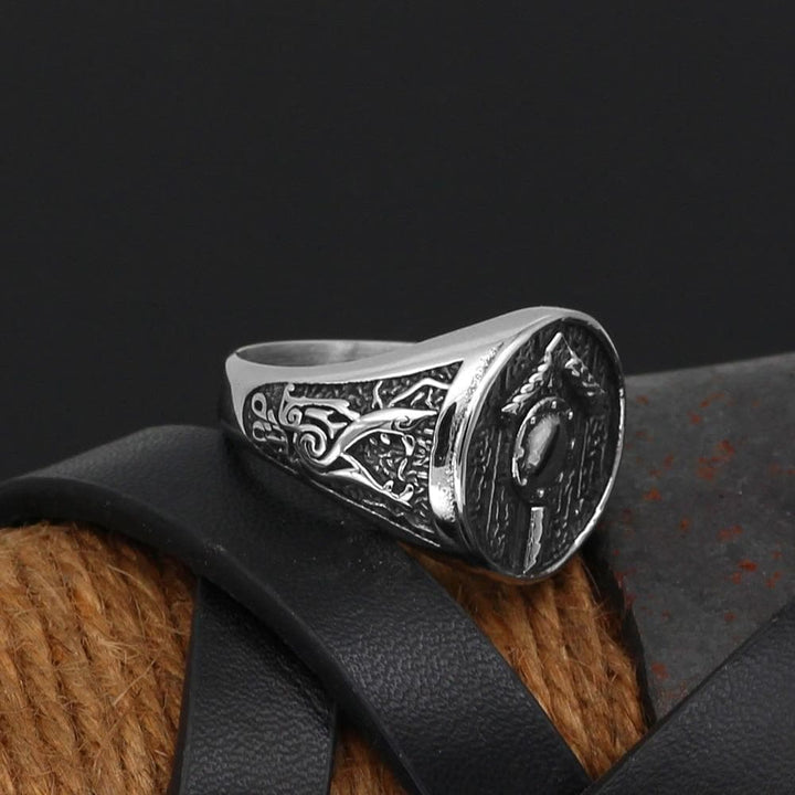 Stainless steel Tiwaz rune signet ring, side view with engraved panel and raised border