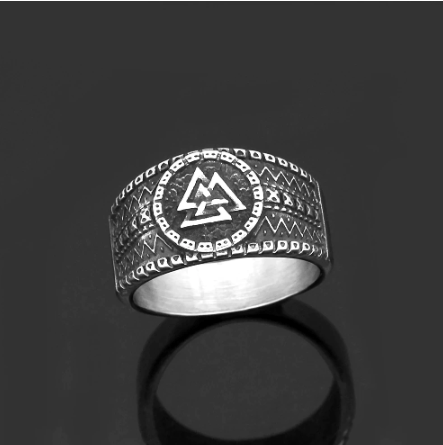 Viking Valknut stainless steel ring with raised circular emblem and etched geometric band