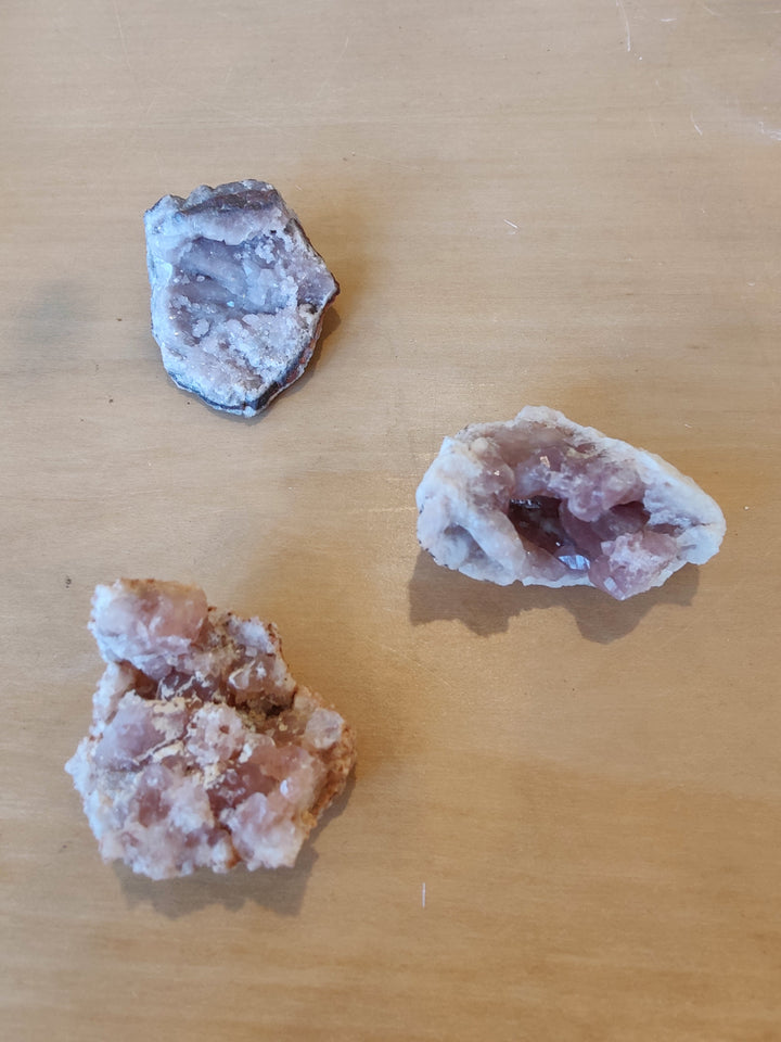 Pink amethyst crystal specimen set of three rough clusters with purple and pink tones