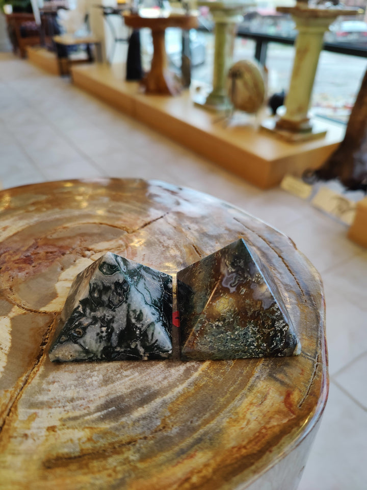 Moss agate pyramid pair with dark green stone and light white quartz veining