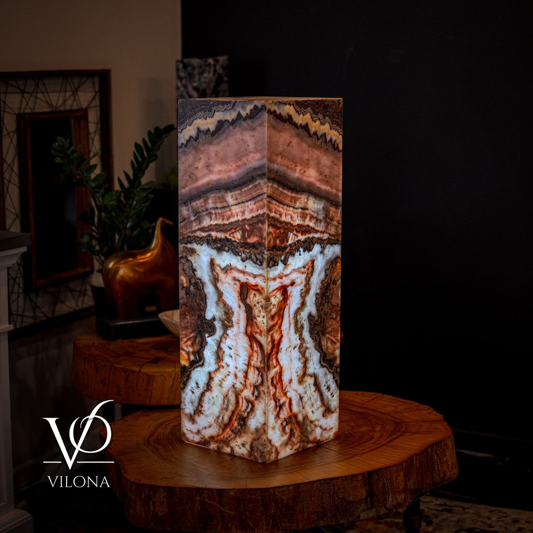 Small square floor lamp with multi-color agate-pattern shade on a round wooden top