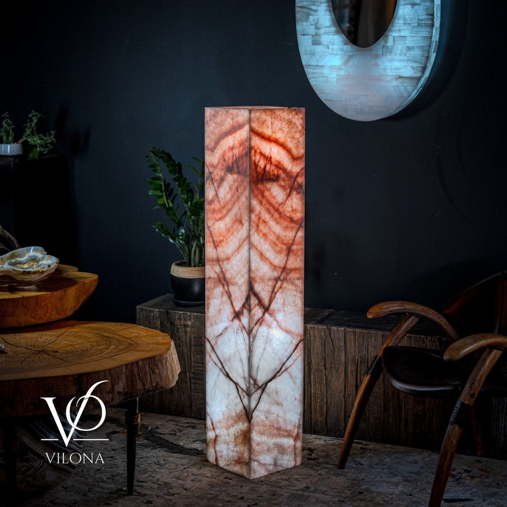 Tall square floor lamp with orange veining over white onyx-look column