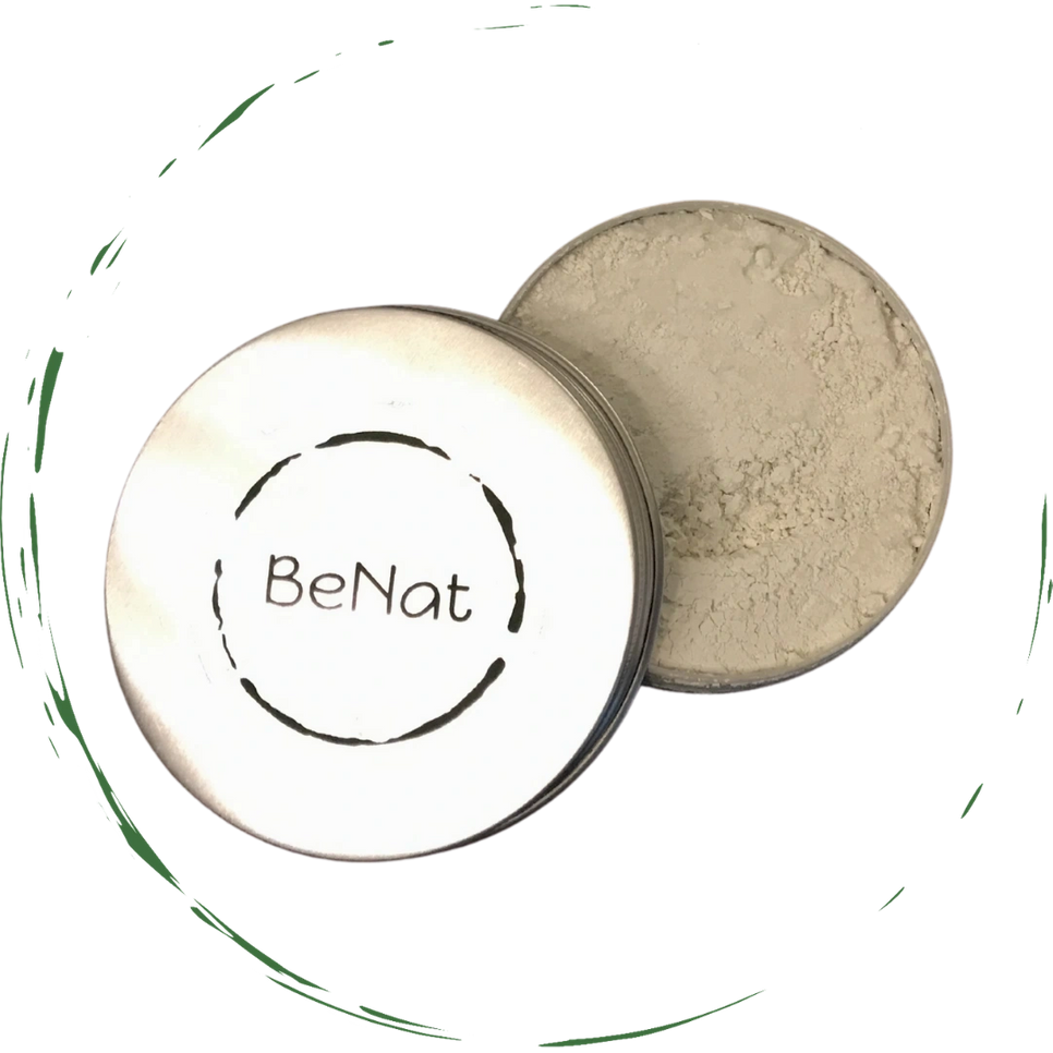 Open tooth powder tin with beige powder and matching round lid