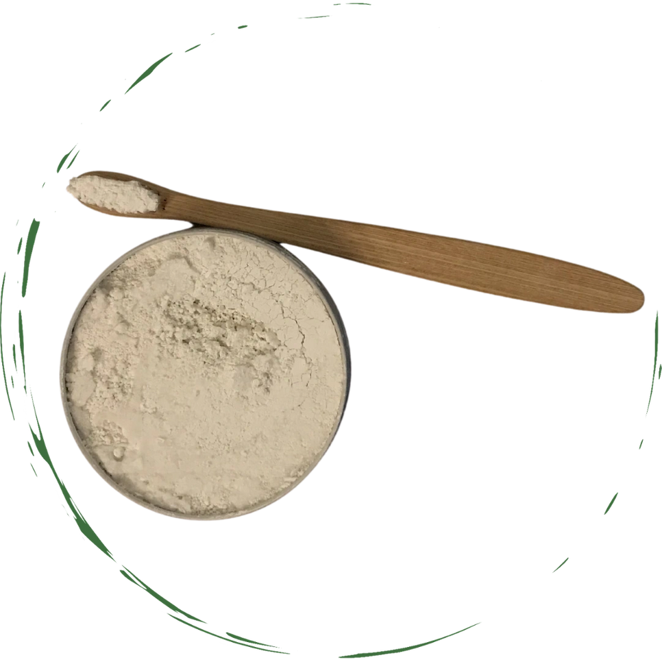 Tooth powder tin with pale beige powder and wooden scoop on top