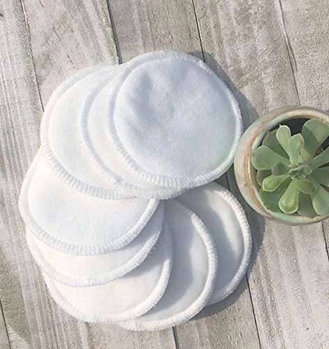 Set of white reusable facial cleansing discs, layered and stacked