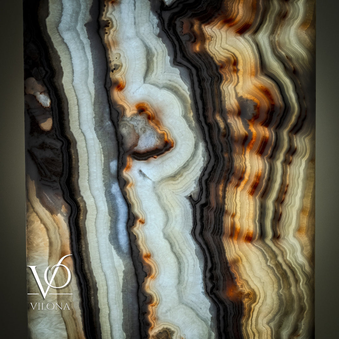 Close-up of square onyx lamp shade showing layered light-blue and amber striations.