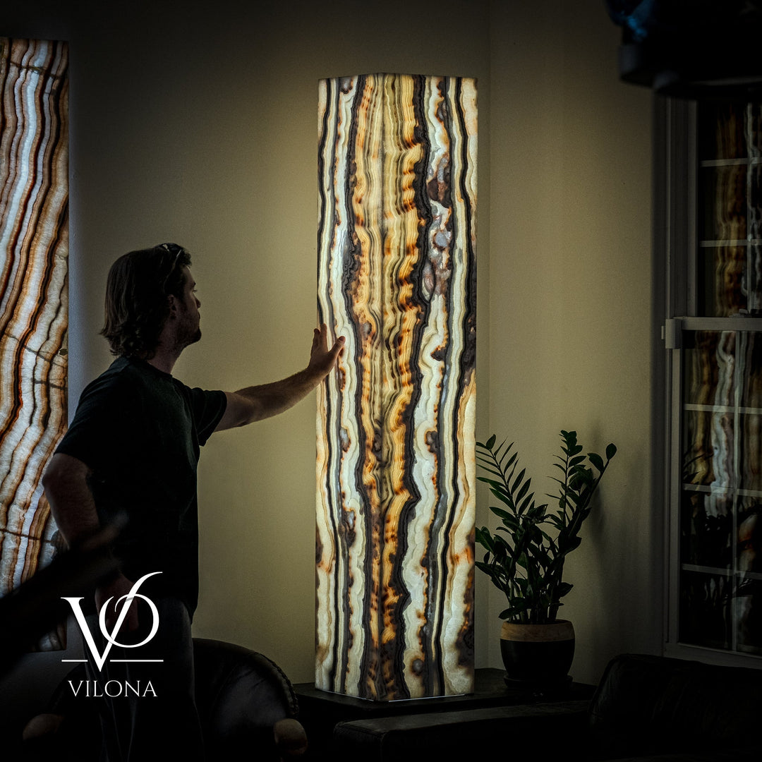 Large floor lamp with tall square onyx shade, vertical cream, blue, and amber veining.