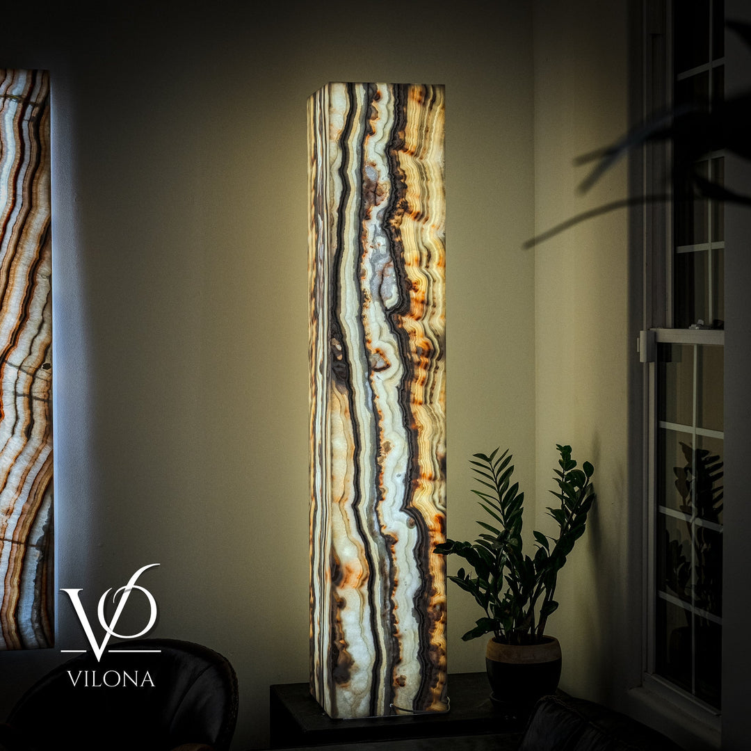 Floor lamp with tall square onyx shade, vertical cream and blue veins with amber highlights.