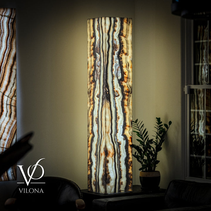 Floor lamp with tall square onyx panel shade, vertical cream, blue, and amber streaks.