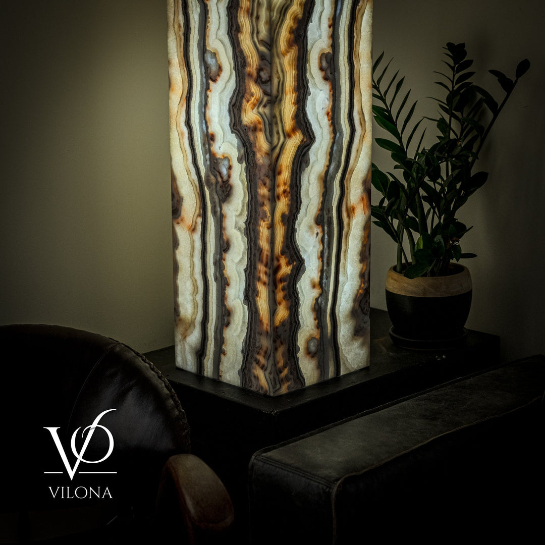 Floor lamp with tall square onyx shade, vertical cream, blue, and gold-brown patterns.