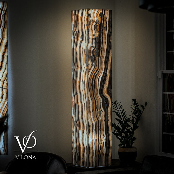 Tall rectangular onyx floor lamp shade with vertical wavy bands in cream, amber, and dark