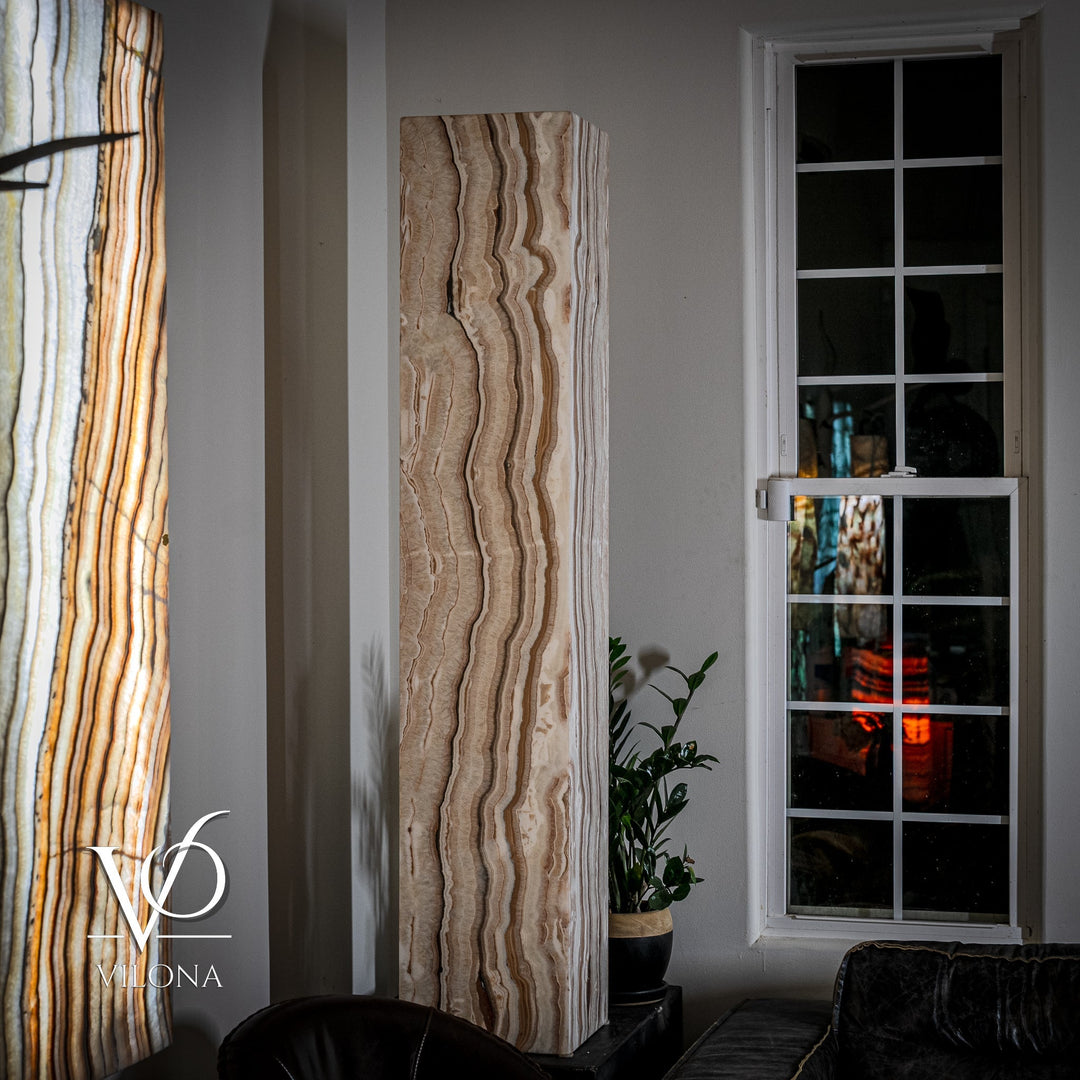 Light beige onyx floor lamp shade with vertical wavy stripes and darker accents