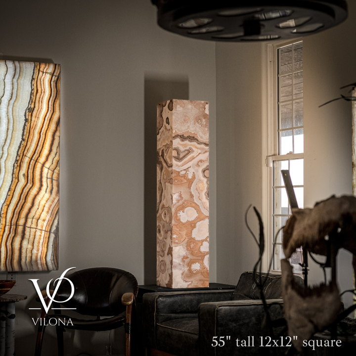 Polished onyx floor lamp with beige and brown rectangular stone column and dark top shade