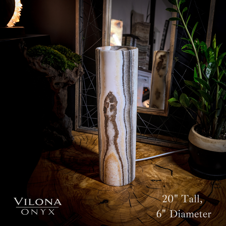 Tall onyx cylinder table lamp, 20" tall and 6" diameter; white outer finish.