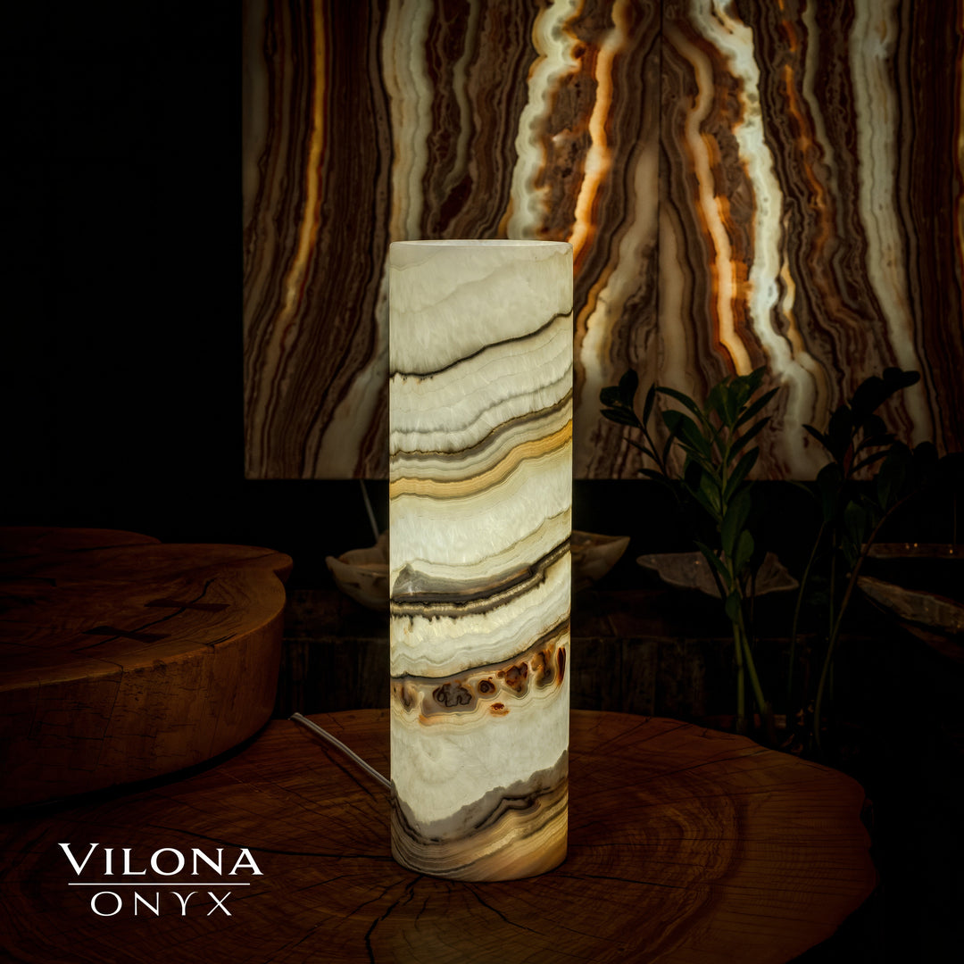 Cylinder table lamp with polished cream onyx body and layered tan and dark bands