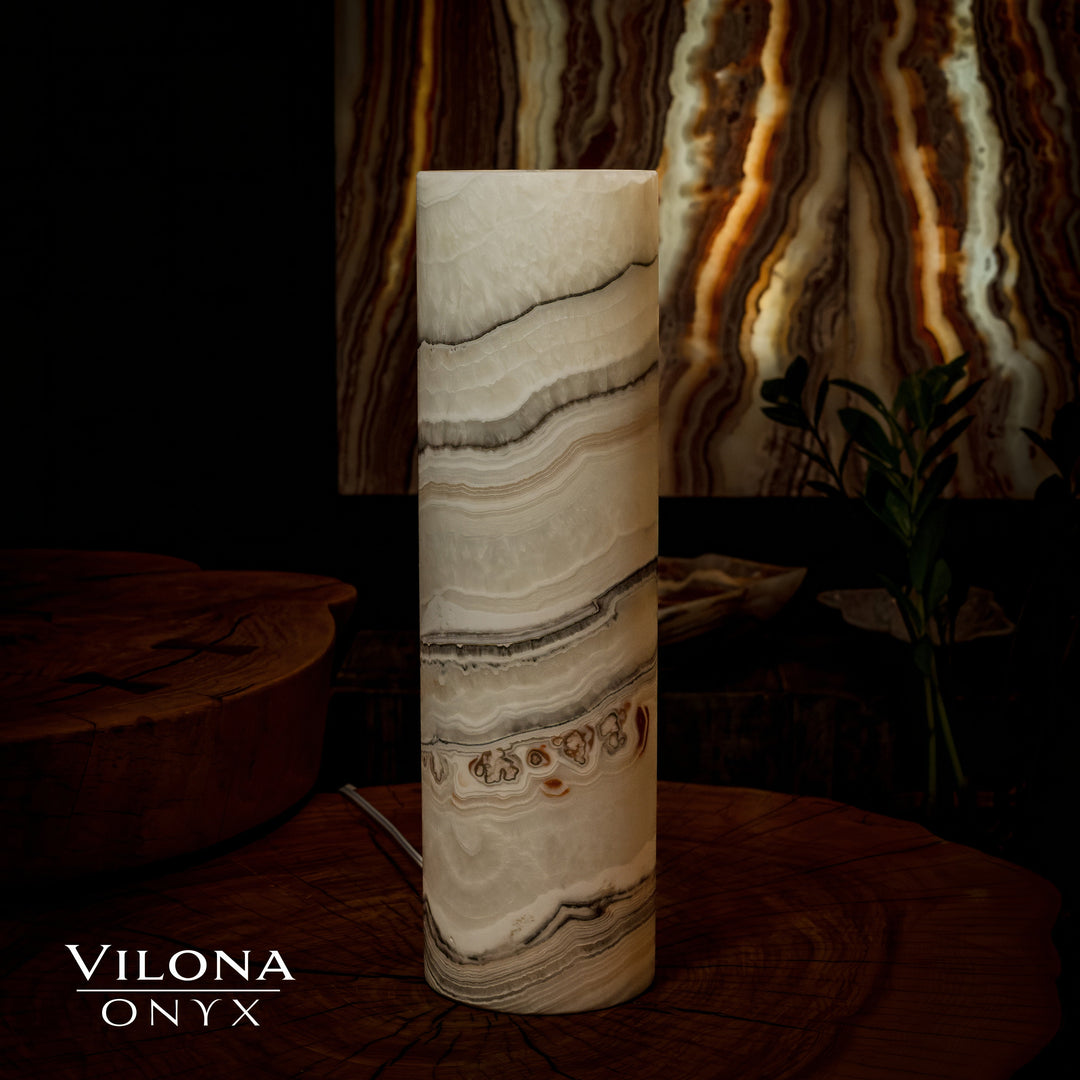 Tall onyx cylinder table lamp in cream with horizontal tan and dark stone striping