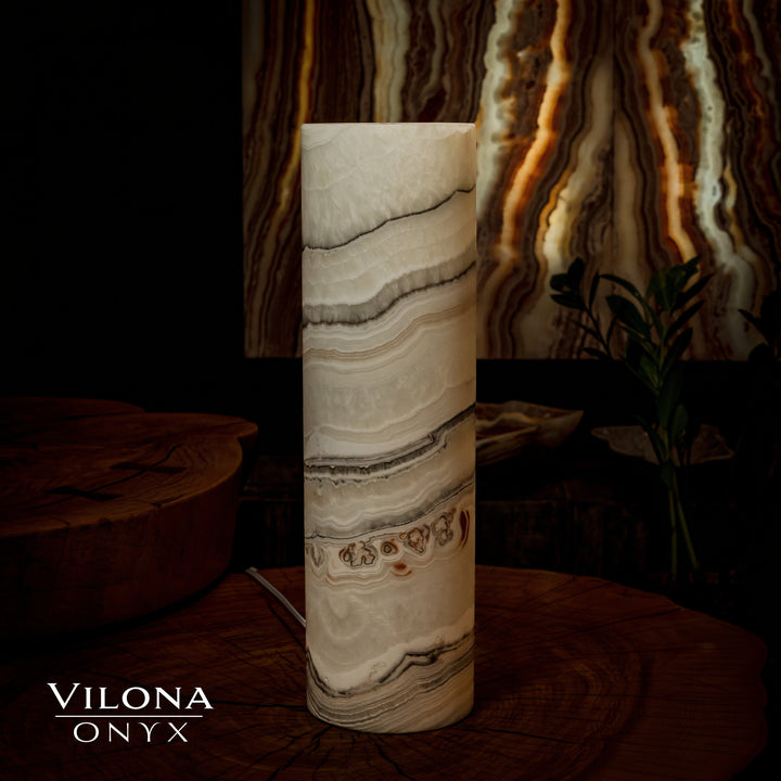 Tall onyx cylinder table lamp in cream with horizontal tan and dark stone striping