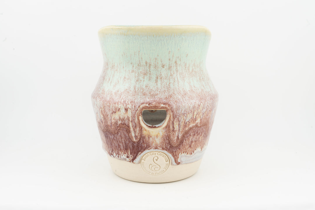Ceramic dried flower sconce with side cutout, pastel teal and pink drips, cream base