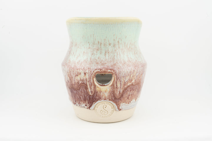 Ceramic dried flower sconce with side cutout, pastel teal and pink drips, cream base