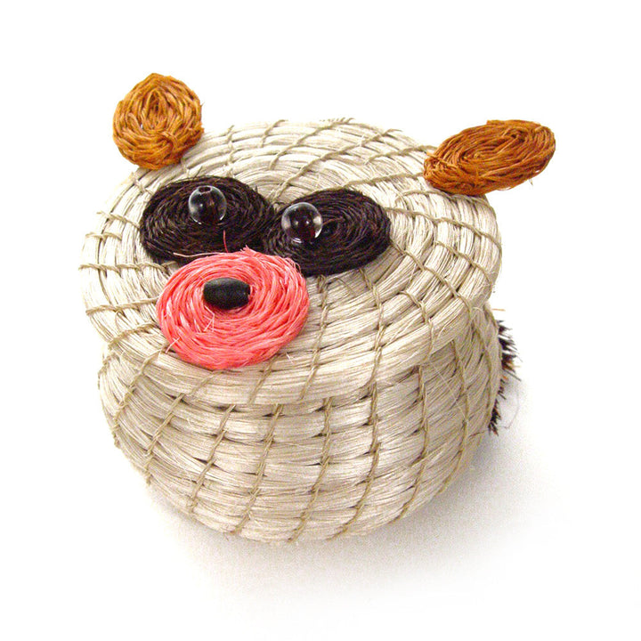 Small woven bear basket featuring black ears and a pink nose with orange paws.