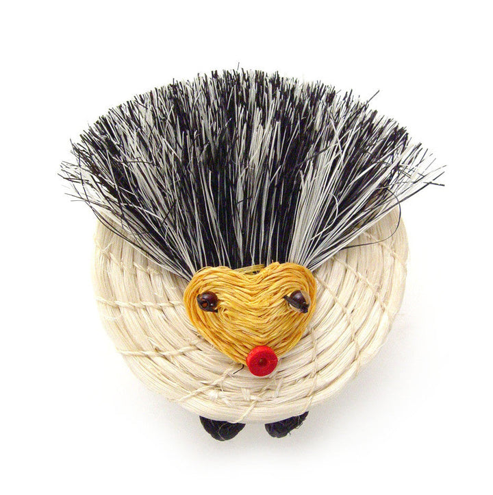 Tiny hedgehog basket with straw body, black bristles, yellow face, red nose