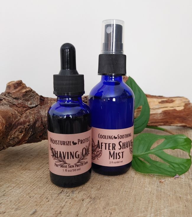 Two blue shaving oil bottles: dropper oil and after-shave mist spray