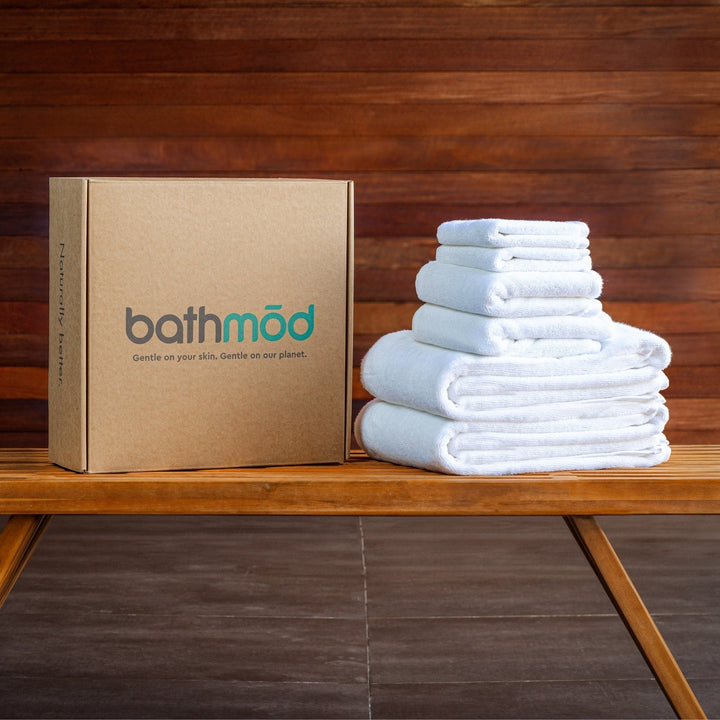 bathmdo bath towel stack in light blue, folded neatly with matching box