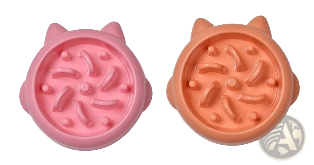 Slow feeder silicone dog bowl set, pink and orange with raised anti-gulp ridges