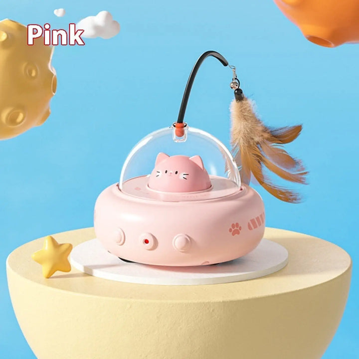Pink UFO cat toy with bell feather wand, clear dome with cat-face graphic