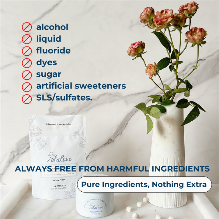 Refill pouch and small jar with loose tablets beside flowers and ingredient icons