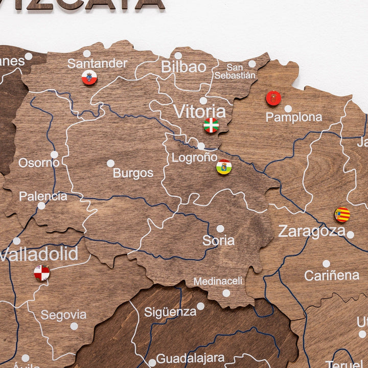 Wooden Spain map segment with regional flag pins