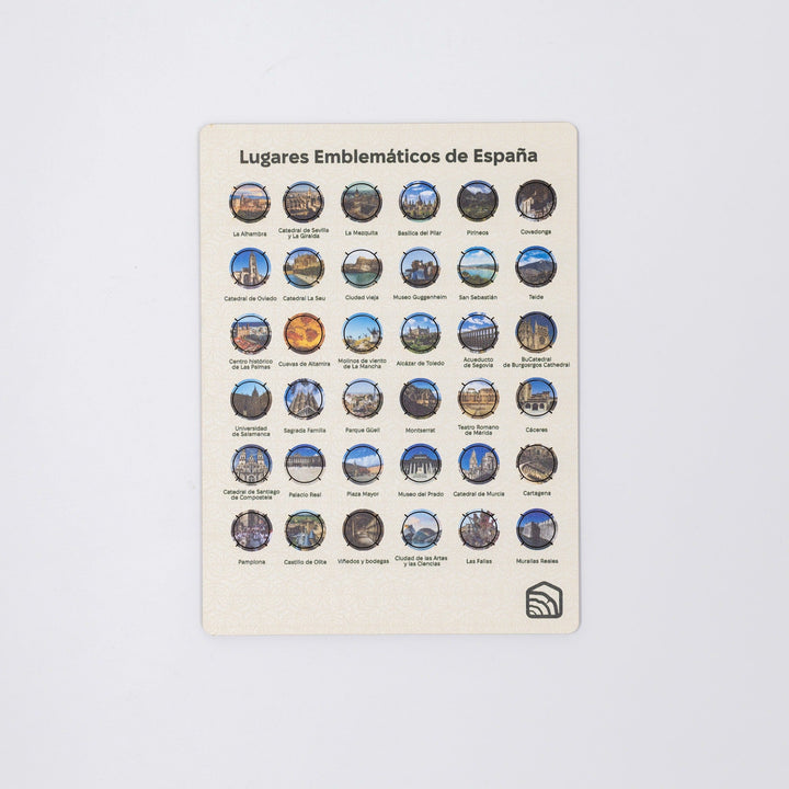 Spain landmark pin collection card with rows of round enamel pins, shows title at top