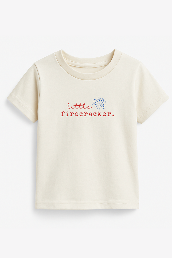 Kids organic T-shirt in off-white with red firecracker and blue burst graphic