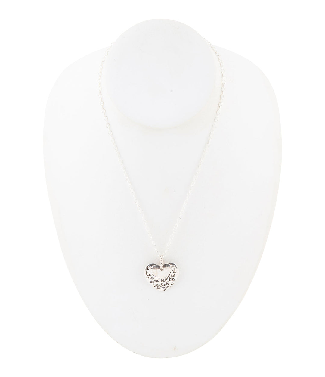 Sterling silver engraved heart pendant necklace on a mannequin bust
