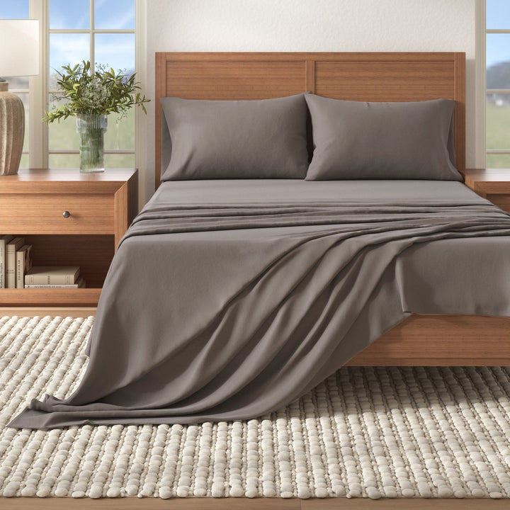 Grey cotton flannel sheet set styled on a bed
