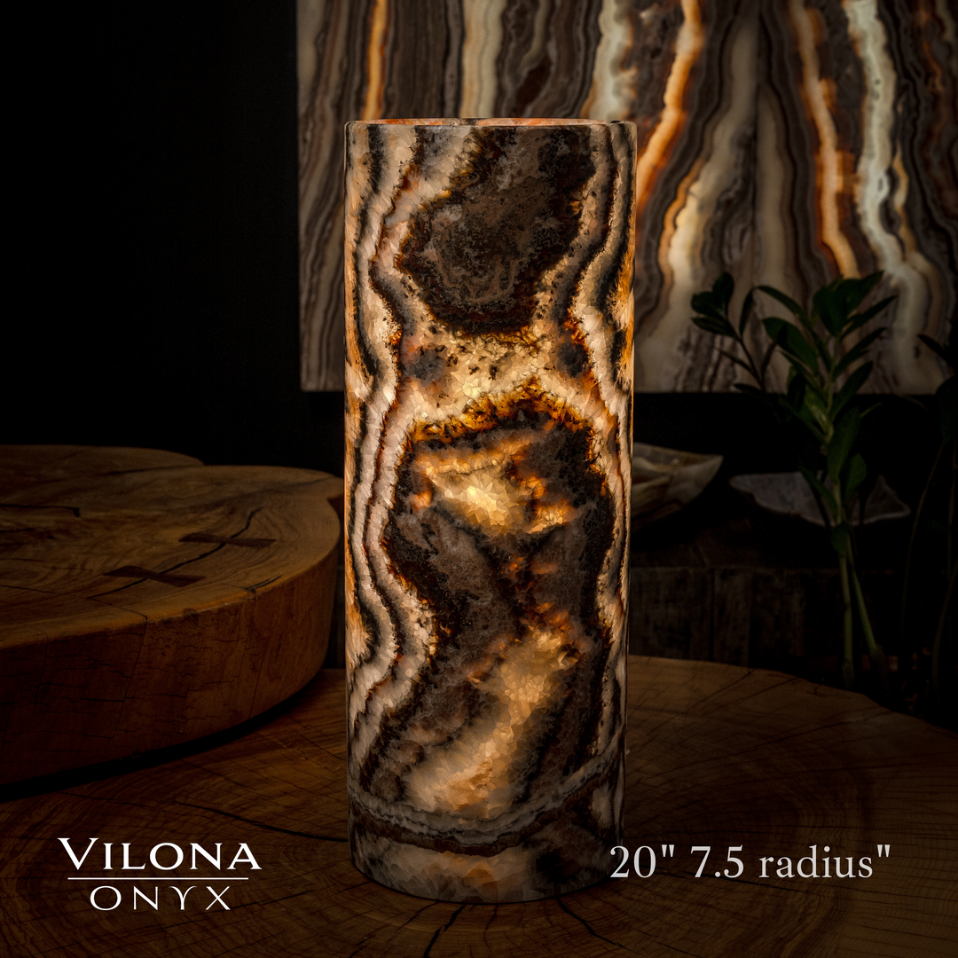 Dark onyx table lamp cylinder with amber crystal glow and wavy swirl pattern