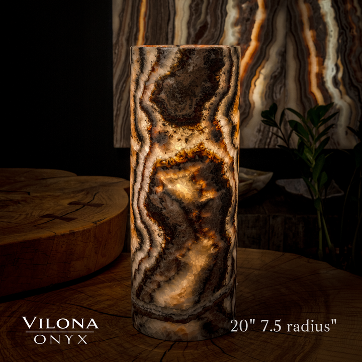 Dark onyx table lamp cylinder with amber crystal glow and wavy swirl pattern