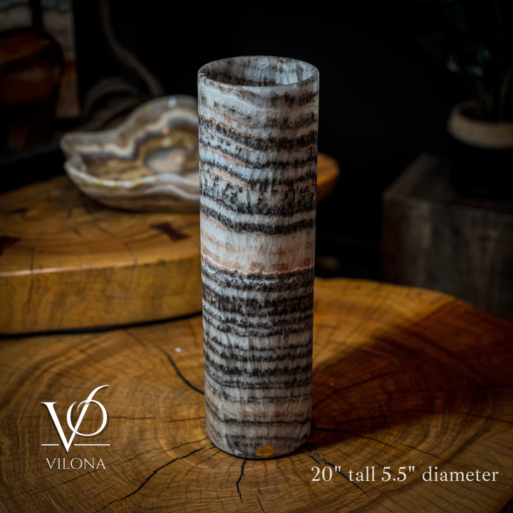 Cylindrical onyx crystal table lamp with amber glow and dark striped bands, 20 in tall, 5.5 in dia