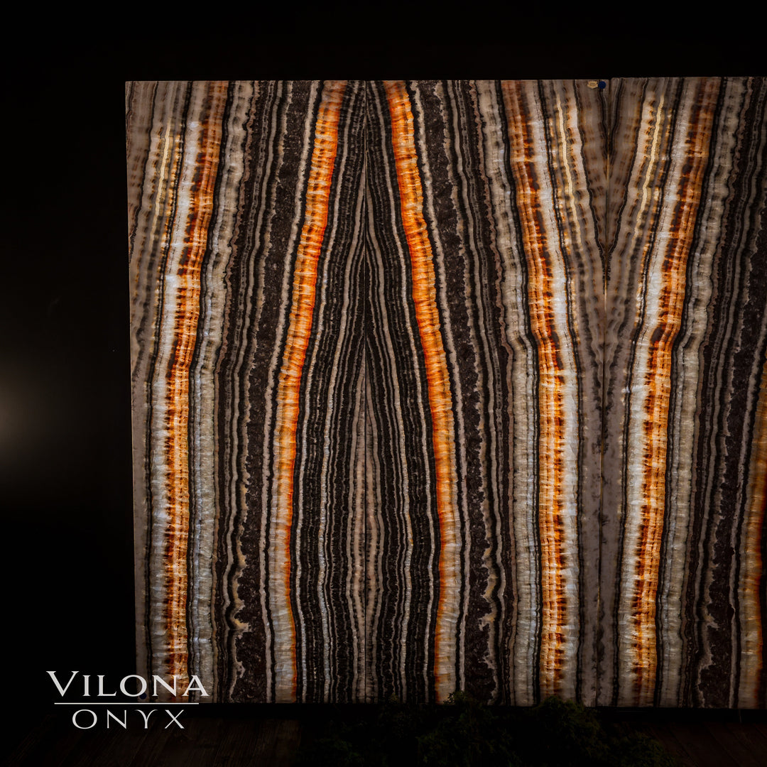 Onyx wall panel set featuring vertical amber, cream, and dark brown wavy stripes