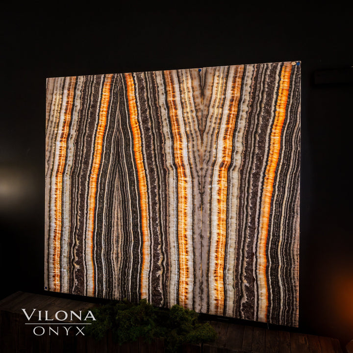 Onyx wall panel set with vertical amber, cream, and dark brown striped pattern