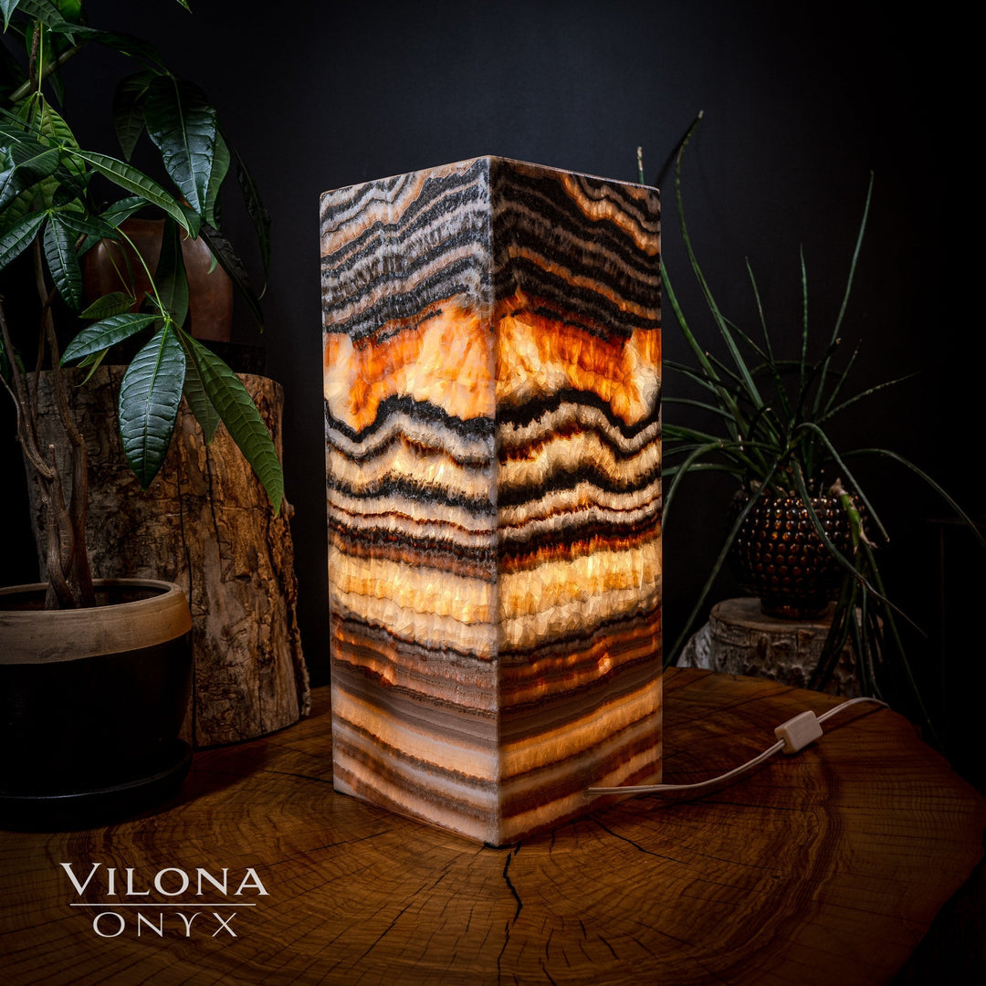 Square table lamp with multicolor onyx pattern in amber, cream, and dark brown