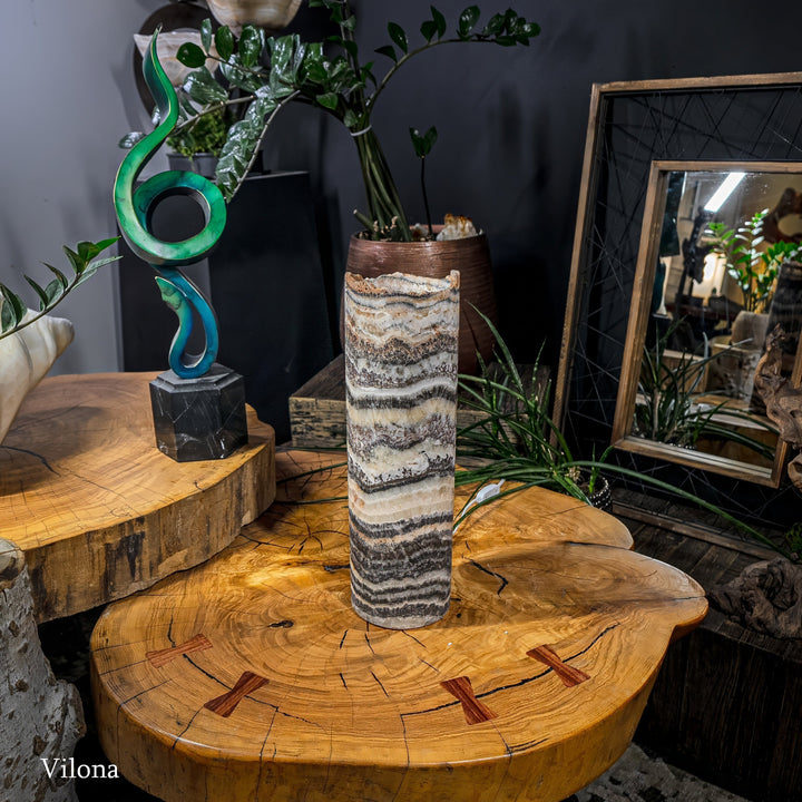 Onyx-pattern table lamp with striped cylinder shade and visible cord