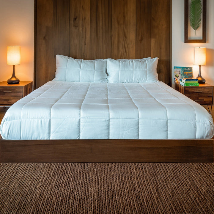 Cooling comforter set with light blue quilted comforter and matching pillow shams
