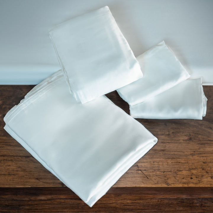 Folded light blue sheet stack with smooth, silky finish
