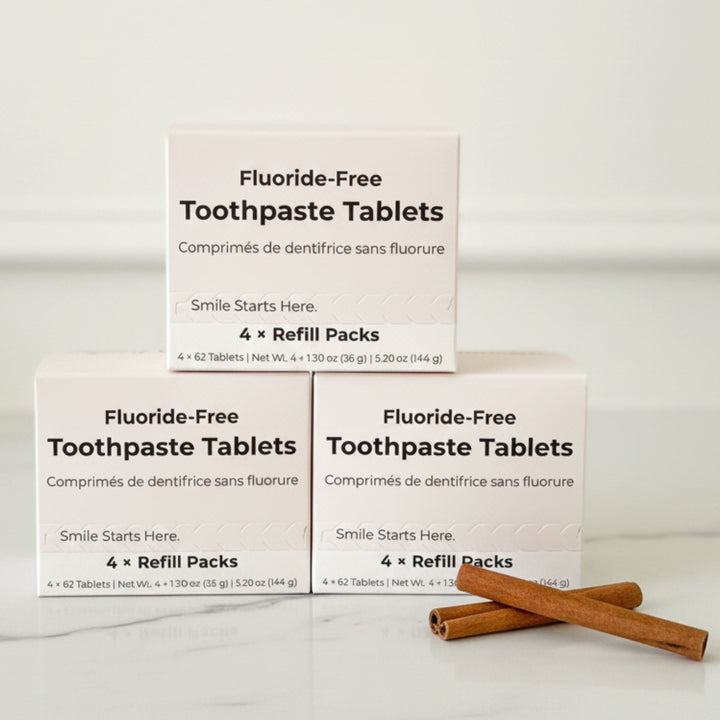 Fluoride-free toothpaste tablet refill pack boxes with cinnamon sticks