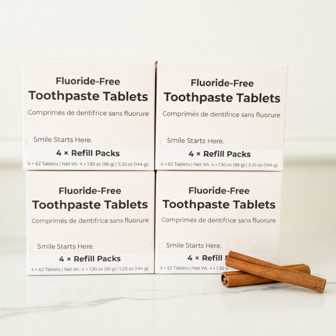 Fluoride-free toothpaste tablet refill packs, four boxes with cinnamon sticks