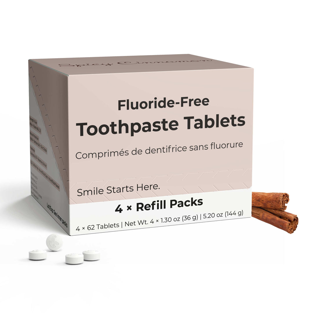 Fluoride-free cinnamon toothpaste tablets box with refill packs and white tablets