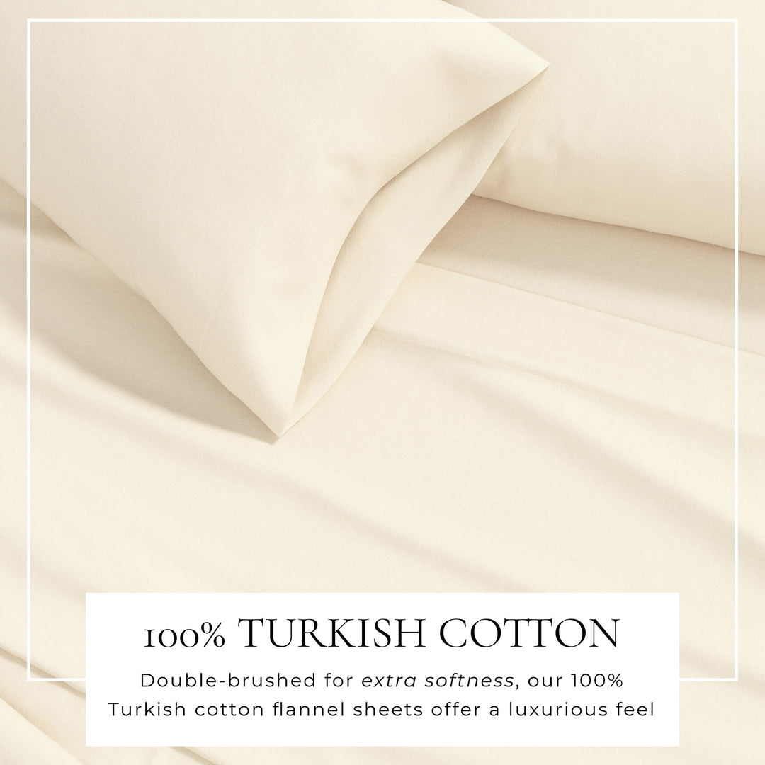 Pristine ivory cotton flannel sheet close-up with soft folded fabric